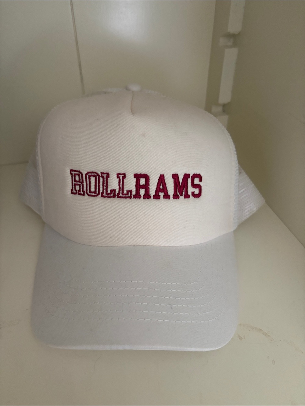 White Trucker Hat with 'ROLL RAMS' Red Embroidery - Fordham University